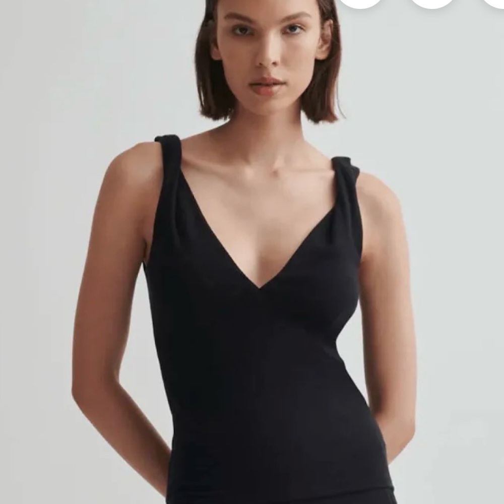 Skin worldwide black twist top